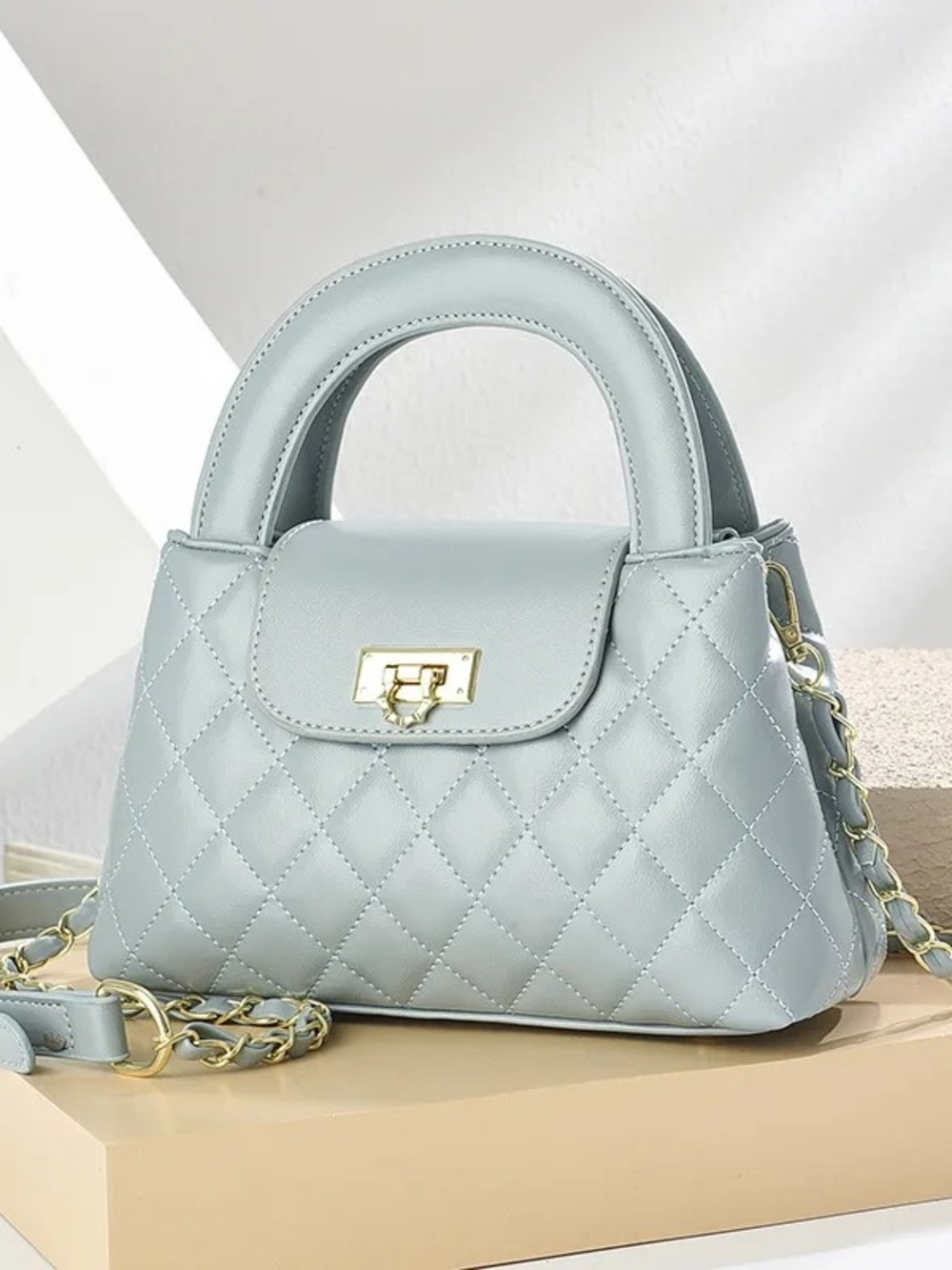 Others Follow Quilted Mini Top-Handle Bag in Pale Blue with Gold Hardware